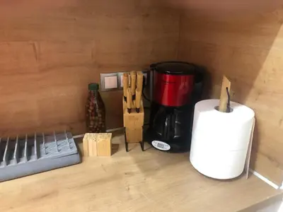 a coffeemaker and a coffee maker in a box at ROYAL RED SUITE NO 1, PIRAEUS PORT in Piraeus