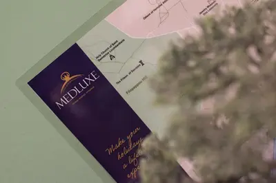 a invitation to a wine tasting event with a plant at MEDLUXE BUSINESS Apartment in Athens