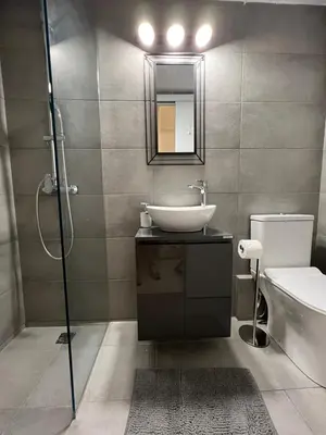 a bathroom with a sink and a shower at Your studio Athens in Athens