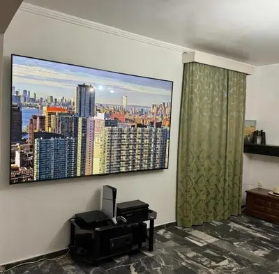 a room with a large picture of a city on the wall at Villa Hermes in Vouliagmeni