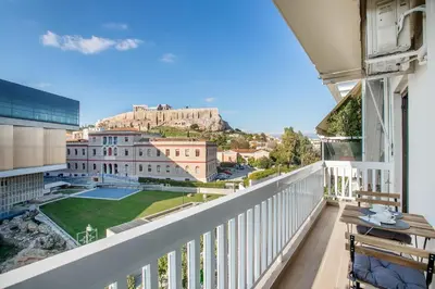 a balcony with a view of a castle at Modern flat in the grounds of Acropolis Monuments -Armonia- in Athens