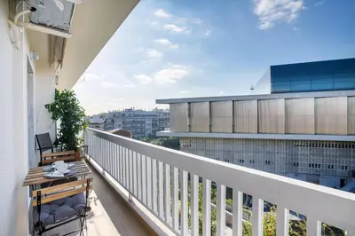 a balcony with a table and a view at Modern flat in the grounds of Acropolis Monuments -Armonia- in Athens