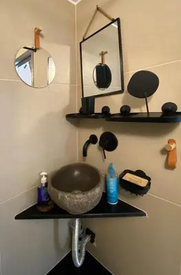 a bathroom with a sink and a mirror at Nest in Mets in Athens