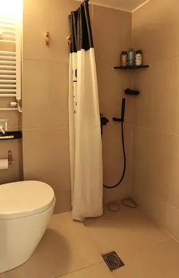 a bathroom with a toilet and a shower at Nest in Mets in Athens