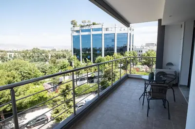 a balcony with a view of a city at Cozy apartment in Palaio Faliro with a great view (D2) in Athens