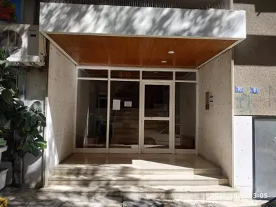 an entrance to a building with a glass door at LG apartment bnb in Athens