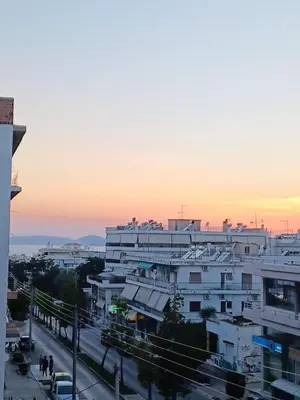 a view of a city at sunset at Glyfada-Elliniko in Athens