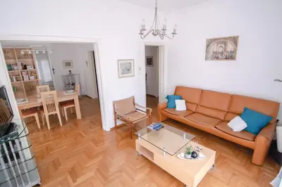 a living room with a couch and a table at The Rebel's Temple in Athens