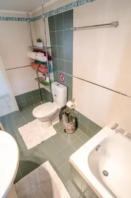a bathroom with a toilet and a sink at The Rebel's Temple in Athens