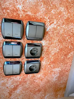 four cell phones sitting on top of a table at The Best Penthouse View -Sea View Athens Reviera & SNFCC in Athens