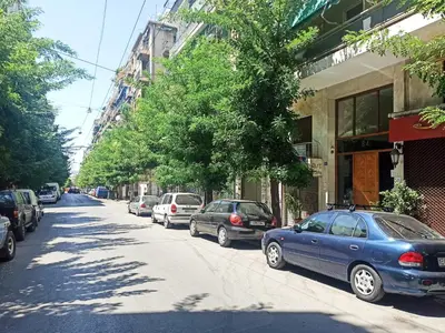a blue car parked on the side of a street at Pipinou Studio in Athens
