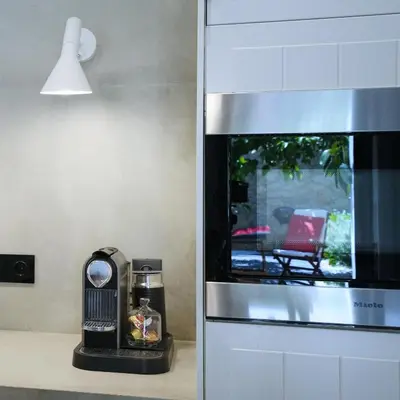 a kitchen with a counter with a stove top oven at P Faliro Riviera Suite in Athens