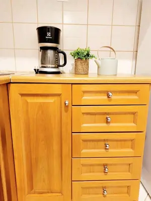 a kitchen counter with a coffee maker on top of it at Lovely equipped apartment in Kallithea Athens in Athens