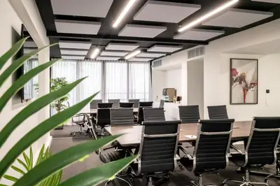 a conference room with a long table and chairs at Hestia - Dimitressa 4 in Athens