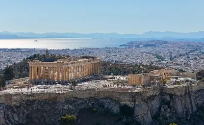 a view of the acropolis of athens from the top of a mountain at Parthenon and Syntagma square view apartment in Athens