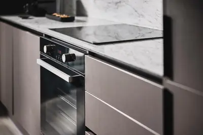 a kitchen with an oven with a counter top at Acropolis Panorama Residence in Athens