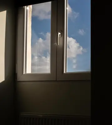 an open window with a view of the sky at Athenian Serene City Escape in Athens
