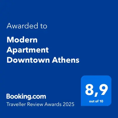 a blue screen with the text awarded to modern appointment downtown athers at Modern Apartment Downtown Athens in Athens