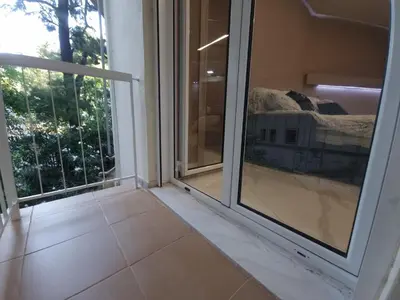 a room with two windows and a tiled floor at CENTRAL in Athens
