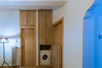 a laundry room with a washer and dryer at Adorable 2 bedroom apartment close to Ancient Athens city center in Athens
