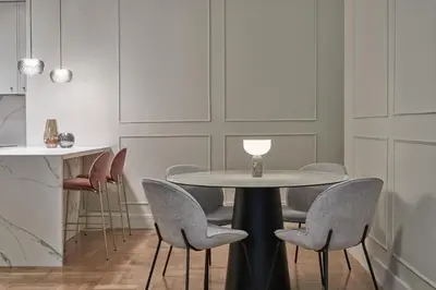a dining room with a table and chairs at Athenian Elite Kolonaki Apt in Athens