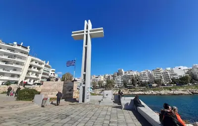 a large cross in the middle of a city at Casa Nova - Appartment near the sea in Piraeus