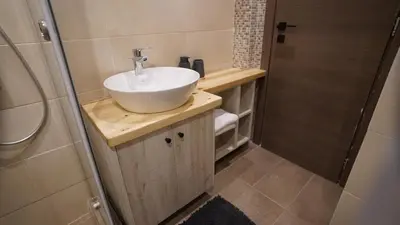a bathroom with a sink and a shower at New Ventiri Suite 3, near Hilton, Athens Central, fully equipped in Athens