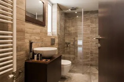 a bathroom with a sink and a toilet and a shower at 2BDR Athens Riviera Sea View Apartment by The Olon in Athens