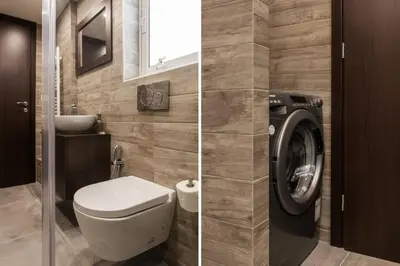 a bathroom with a toilet and a washing machine at 2BDR Athens Riviera Sea View Apartment by The Olon in Athens