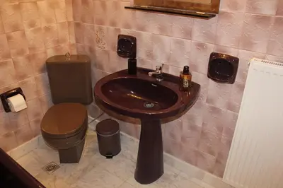 a bathroom with a sink and a toilet at Modern house next to Metro station to explore Athens in Athens