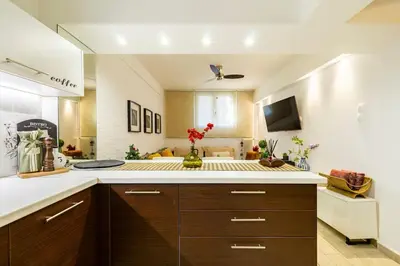 a kitchen with a sink and a counter top at The excellent home in Athens