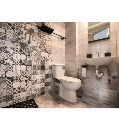 a bathroom with a toilet and a sink at Alley's house Athens in Athens