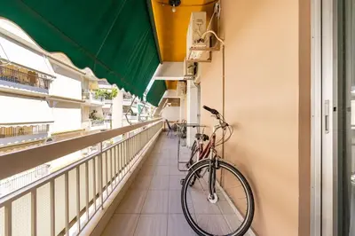 a bike parked in a hallway of a building at Urban grey in Athens