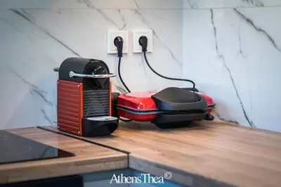 a toaster sitting on top of a wooden counter top at AthensThea Alpha Luxury Penthouse Apt in Omonia in Athens