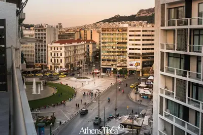 a view of a street in a city with buildings at AthensThea Beta Luxury Penthouse Apt in Omonia in Athens