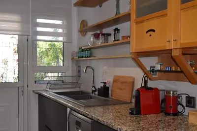a kitchen with a sink and a counter top at h2h Dafni #Family home near Athens, airport, ports with garden in Athens