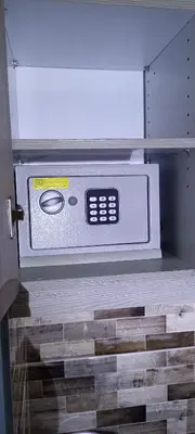 a microwave oven in a drawer in a refrigerator at Lovely apartment in the center of Athens. in Athens