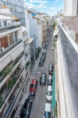 an overhead view of a city street with cars parked at Phaedrus Living Luxury Penthouse Ploutarchou in Athens