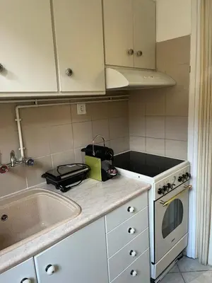 a kitchen with a sink and a stove at Alex’s home next to Laiko in Athens