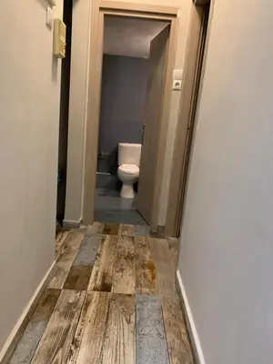 a bathroom with a toilet in a hallway at Athens City Themis 6 in Athens