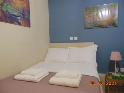 a bed in a room with two white pillows at Central Mini & full renovated Studio @ Syntagma in Athens