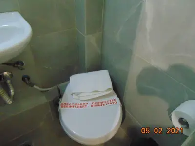 a bathroom with a white toilet and a sink at Central Mini & full renovated Studio @ Syntagma in Athens