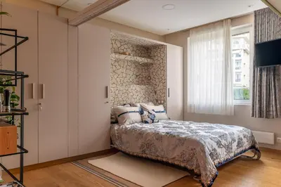 a bedroom with a bed and a window at Zen home in Athens