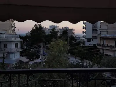 a view of a city from a balcony at Kalamaki Guest House in Athens