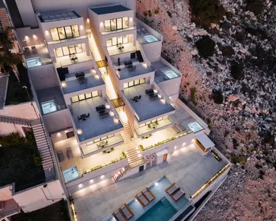 an overhead view of a building with a swimming pool at Saronida Hills in Saronida
