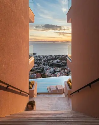 a view of the ocean from the balcony of a building at Saronida Hills in Saronida