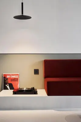 a room with a bed and a book at The Newel Metaxourgeio by Athens Stay in Athens