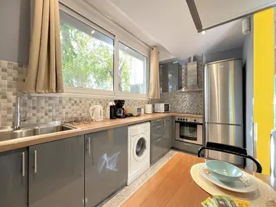 a kitchen with a sink and a dishwasher at Historic Center getaway 10'walk to Acropolis hill in Athens