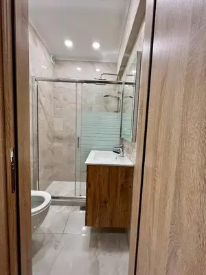 a bathroom with a shower and a sink and a toilet at Cute Corner In The Centre VIPGreece in Athens