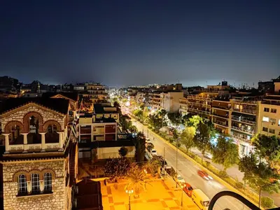 a view of a city at night with cars at Kali - Thea Spacious 2 BR Penthouse, City View in Athens